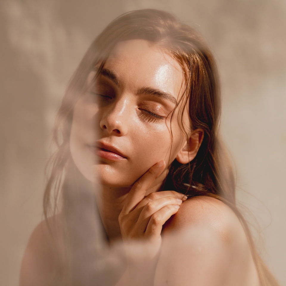Beauty portrait of a young Western woman shot in warm tones