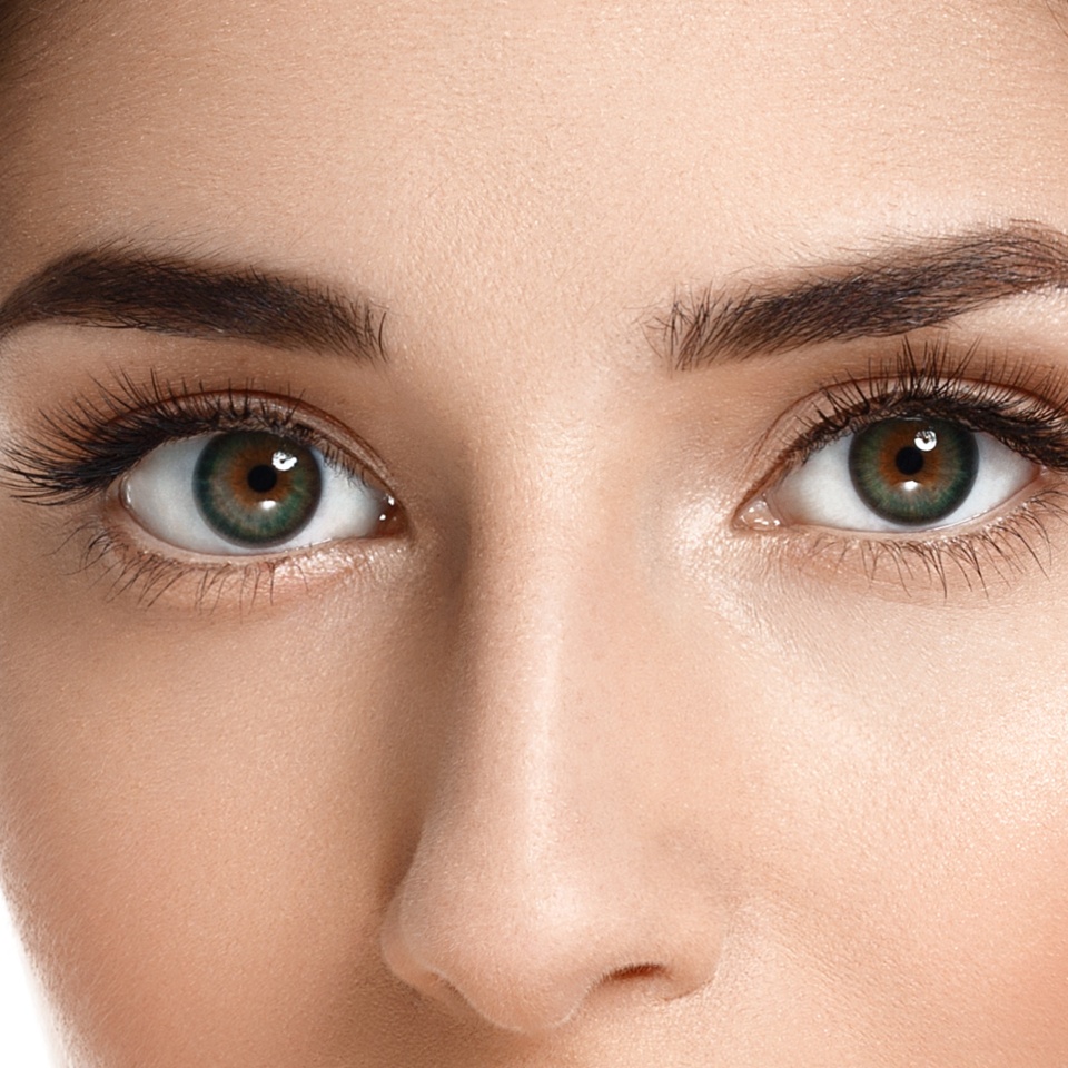 Eyes woman lashes. Beautiful Brunette Woman Portrait with healthy Hair.Clear Fresh Skin.Smiling Girl Isolated on a White Background.Skincare.Spa.Beauty Model